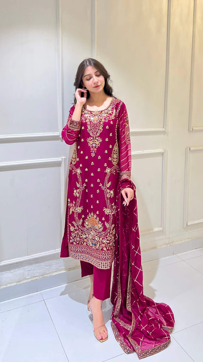 Woman wearing premium chiffon embroidered shalwar kameez with dupatta – front view